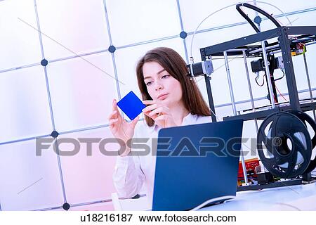 Designer working with 3D printer. View Large Photo Image Stock Photo - Designer working with 3D printer.. Fotosearch