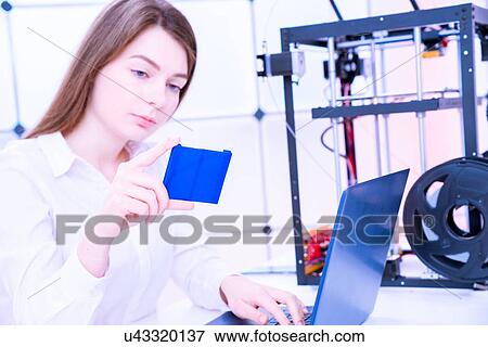 Designer working with 3D printer. View Large Photo Image Stock Photo - Designer working with 3D printer.. Fotosearch