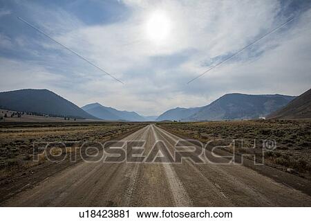 Stock Image - Dirt road through Sun Valley, Idaho, USA. Fotosearch