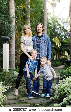 Stock Photo - Family in garden. Fotosearch