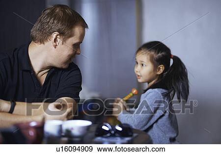 Stock Photo - Father with his adopted daughter. Fotosearch