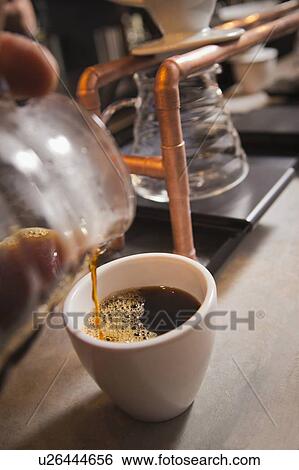 Filter coffee being poured View Large Photo Image Stock Photograph - Filter coffee being poured. Fotosearch