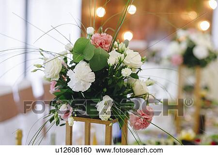 Flower arrangement at wedding View Large Photo Image Stock Image - Flower arrangement at wedding. Fotosearch
