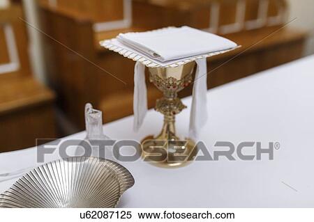 Stock Photography - Folded cloth on goblet at wedding. Fotosearch