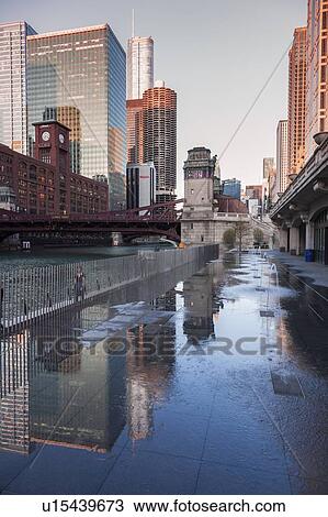 Fountains by office buildings in Chicago, Illinois, USA View Large Photo Image Stock Image - Fountains by office buildings in Chicago, Illinois, USA. Fotosearch