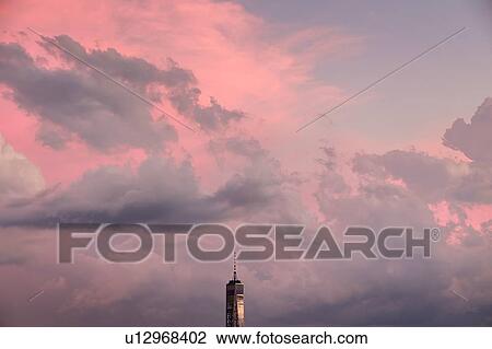 Stock Image - Freedom Tower against sky at sunset in New York City, USA. Fotosearch