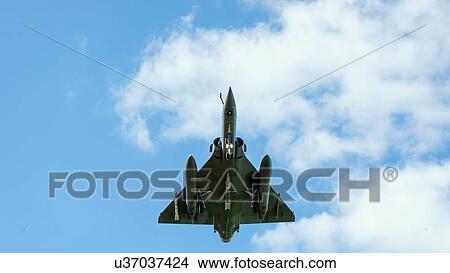 French Mirage 2000 fighter plane taking part in NATO exercise Frysian flag, low angle against blue sky, Netherlands View Large Photo Image Picture - French Mirage 2000 fighter plane taking part in NATO exercise Frysian flag, low angle against blue sky, Netherlands. Fotosearch