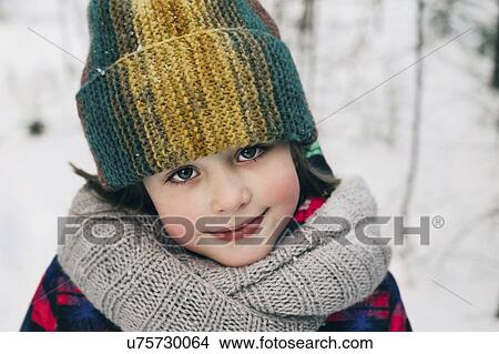 Girl in woollen hat during winter View Large Photo Image Picture - Girl in woollen hat during winter. Fotosearch