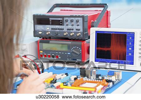 Girl working on electronics project. View Large Photo Image Stock Photo - Girl working on electronics project.. Fotosearch