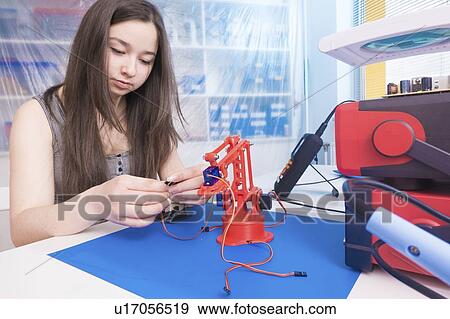 Girl working on robotics project. View Large Photo Image Stock Photo - Girl working on robotics project.. Fotosearch