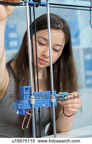 Girl working on robotics project. View Large Photo Image Stock Photography - Girl working on robotics project.. Fotosearch