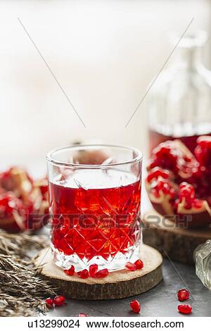 Picture - Glass of pomegranate juice. Fotosearch