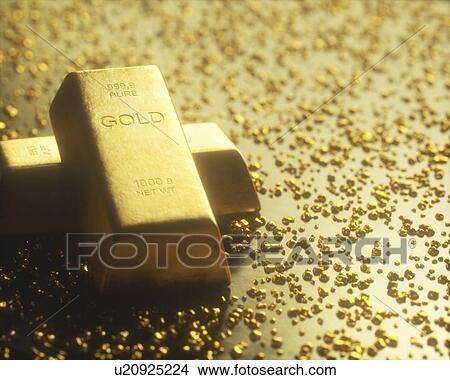 Picture - Gold bars and nuggets, studio shot.. Fotosearch