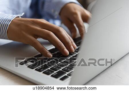 Hands of woman typing on laptop View Large Photo Image Picture - Hands of woman typing on laptop. Fotosearch