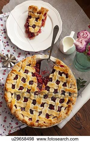 Stock Photo - High angle view of cherry pie. Fotosearch
