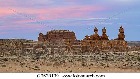 Hoodoos at sunset in Goblin Valley State Park, Utah, USA View Large Photo Image Stock Photo - Hoodoos at sunset in Goblin Valley State Park, Utah, USA. Fotosearch