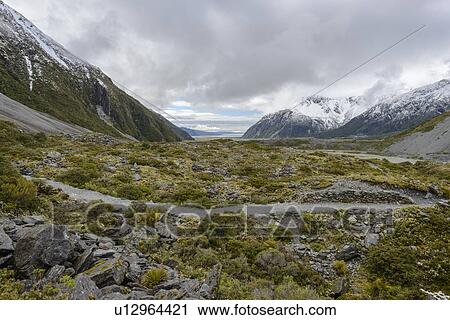 Hooker Valley in Mount Cook National Park, New Zealand View Large Photo Image Stock Image - Hooker Valley in Mount Cook National Park, New Zealand. Fotosearch