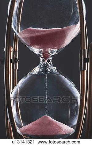 Hourglass with sand. View Large Photo Image Stock Image - Hourglass with sand.. Fotosearch