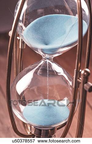 Stock Photo - Hourglass with sand.. Fotosearch