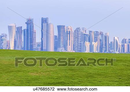 Lawn by skyline of Doha, Qatar View Large Photo Image Stock Image - Lawn by skyline of Doha, Qatar. Fotosearch