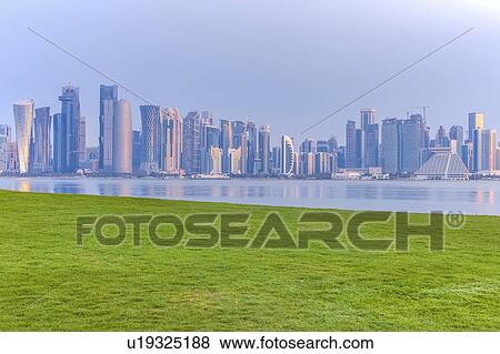 Lawn by skyline of Doha, Qatar View Large Photo Image Stock Photo - Lawn by skyline of Doha, Qatar. Fotosearch