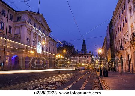 Stock Image - Light trails on street at night in Lviv, Ukraine. Fotosearch