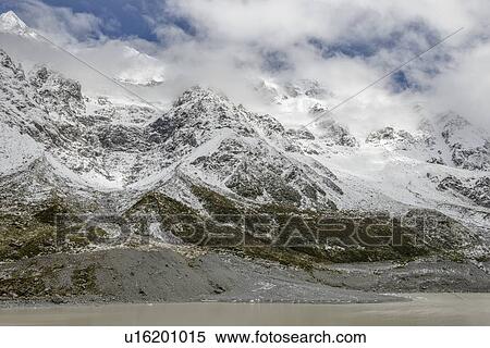 Low cloud over mountains in Mount Cook National Park, New Zealand View Large Photo Image Stock Photography - Low cloud over mountains in Mount Cook National Park, New Zealand. Fotosearch