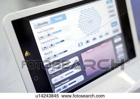 Stock Photography - Machine touchscreen of laser machine in clinic, close-up.. Fotosearch