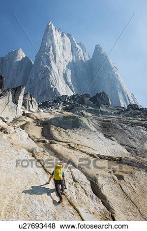 Stock Photo - Man mountain climbing in Bugaboo Provincial Park, British Columbia, Canada. Fotosearch
