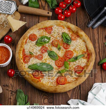 Margherita pizza with ingredients View Large Photo Image Picture - Margherita pizza with ingredients. Fotosearch