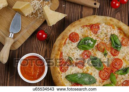 Margherita pizza with ingredients View Large Photo Image Stock Image - Margherita pizza with ingredients. Fotosearch