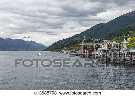 Stock Photo - Marina on Lake Wakatipu in Queenstown, New Zealand. Fotosearch