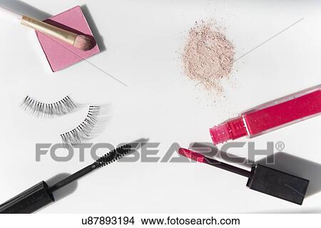 Mascara, lip gloss, false eyelashes and blush View Large Photo Image Picture - Mascara, lip gloss, false eyelashes and blush. Fotosearch