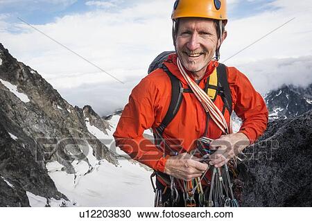 Mature man mountain climbing on Mount Stuart in North Cascade Mountains, Washington, USA View Large Photo Image Stock Image - Mature man mountain climbing on Mount Stuart in North Cascade Mountains, Washington, USA. Fotosearch