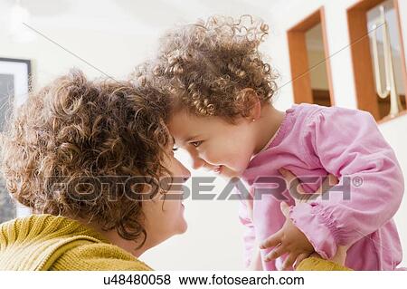 Mother and daughter face to face View Large Photo Image Stock Photo - Mother and daughter face to face. Fotosearch