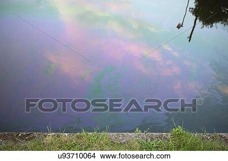 Motor oil slick on canal, Oldbury, West Midlands. View Large Photo Image Picture - Motor oil slick on canal, Oldbury, West Midlands.. Fotosearch