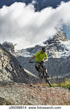 Picture - Mountain biking, Saas-Fee, Valais, Switzerland. Fotosearch