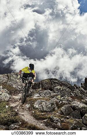 Stock Photo - Mountain biking, Saas-Fee, Valais, Switzerland. Fotosearch