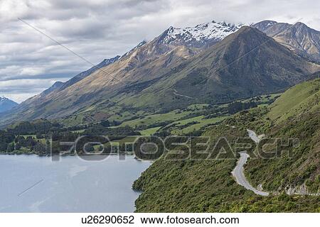 Stock Image - Mountains by Lake Wakatipu near Queenstown, New Zealand. Fotosearch