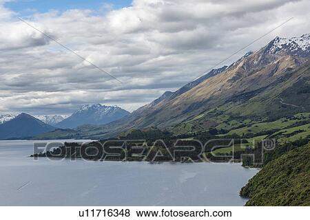 Stock Photo - Mountains by Lake Wakatipu near Queenstown, New Zealand. Fotosearch