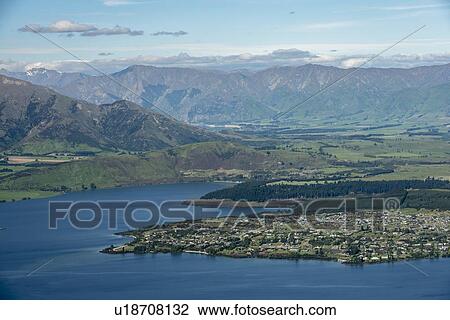 Stock Image - Mountains by Lake Wanaka in New Zealand. Fotosearch