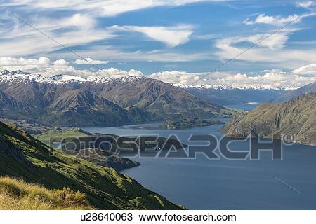 Stock Image - Mountains by Lake Wanaka in New Zealand. Fotosearch