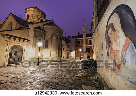 Mural of Virgin Mary by Armenian Cathedral at night in Lviv, Ukraine View Large Photo Image Stock Image - Mural of Virgin Mary by Armenian Cathedral at night in Lviv, Ukraine. Fotosearch