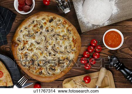 Mushroom pizza with ingredients View Large Photo Image Picture - Mushroom pizza with ingredients. Fotosearch