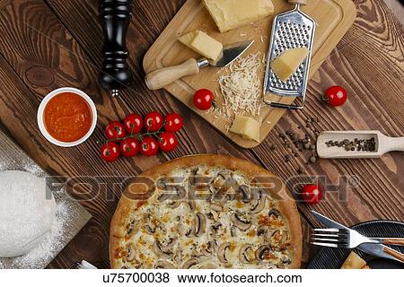 Mushroom pizza with ingredients View Large Photo Image Stock Photo - Mushroom pizza with ingredients. Fotosearch