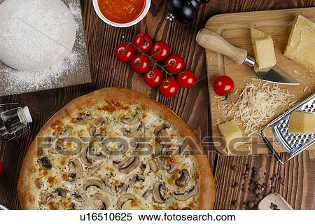 Mushroom pizza with ingredients View Large Photo Image Stock Photography - Mushroom pizza with ingredients. Fotosearch