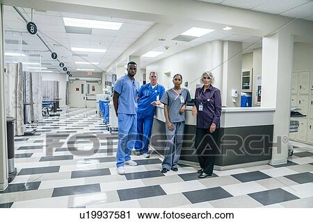 Stock Image - Nurses and doctors in hospital. Fotosearch