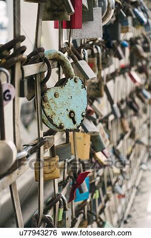 Stock Photograph - Padlocks on fence in Barcelona, Spain. Fotosearch