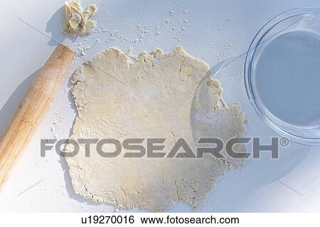 Stock Photograph - Pastry with rolling pin and bowl. Fotosearch