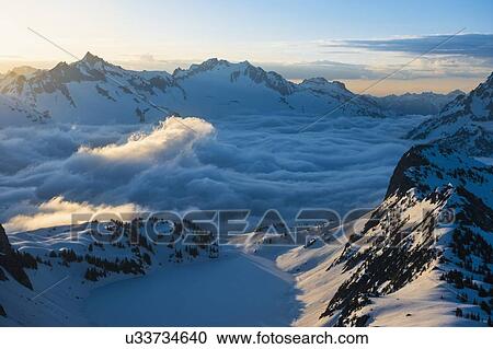 Stock Image - Peaks of Cascade Mountains in North Cascades National Park, Washington State, USA. Fotosearch